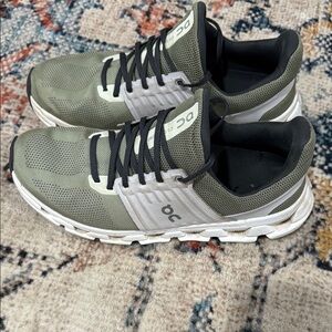 On Running Green and White Athletic Shoes with Cushioned Sole